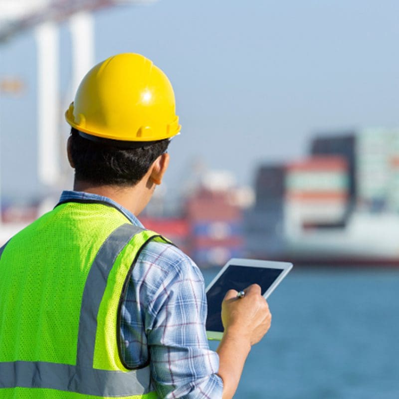 Dock worker waiting for ship to dock