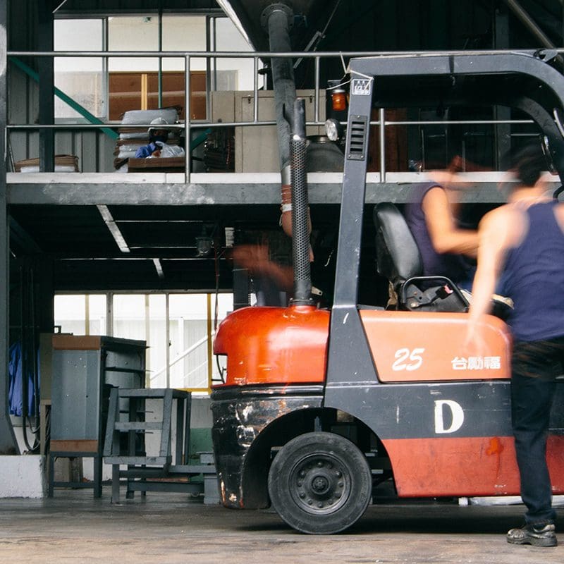 A forklift in a plastic factory A forklift in a plastic factory