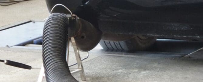 vaccumm hose sucking the gas from muffler