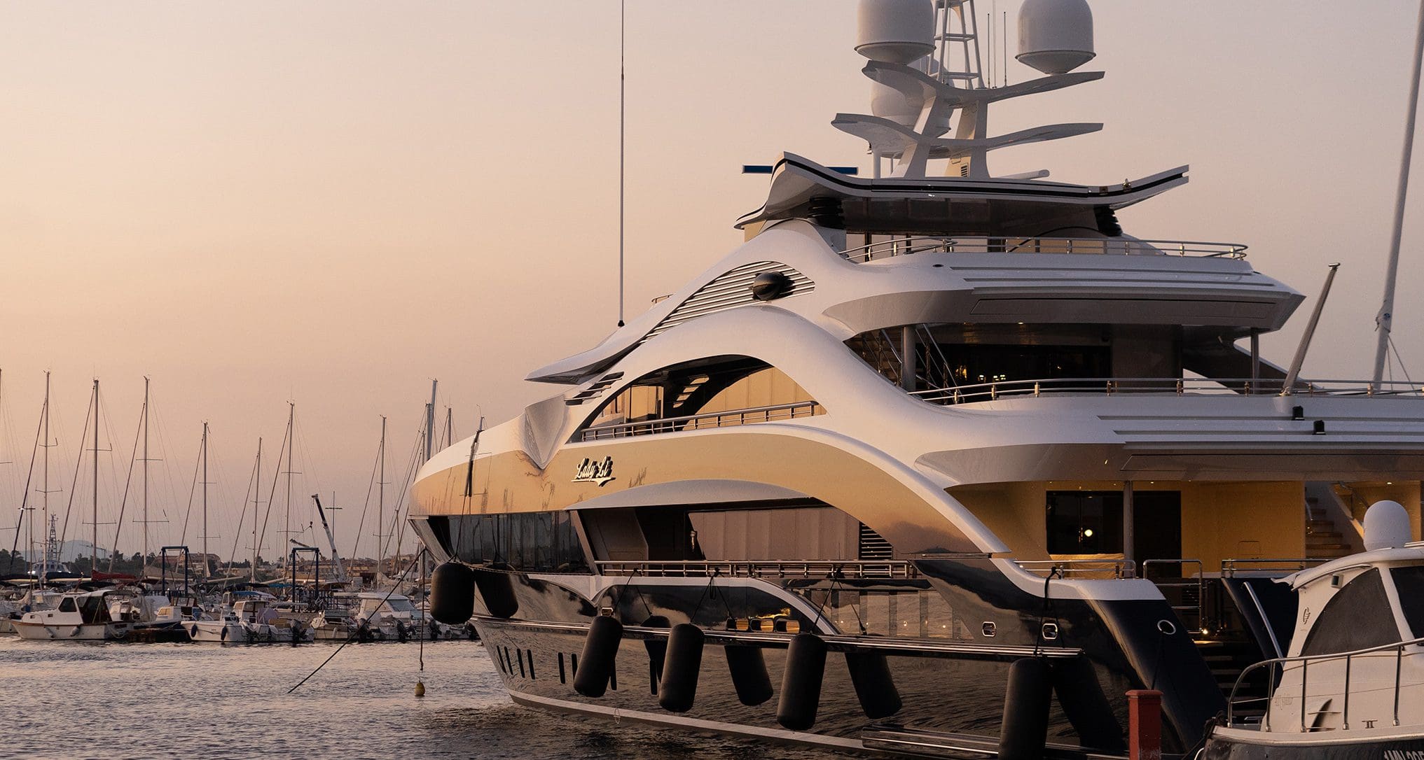 beautiful yacht docking at sunset