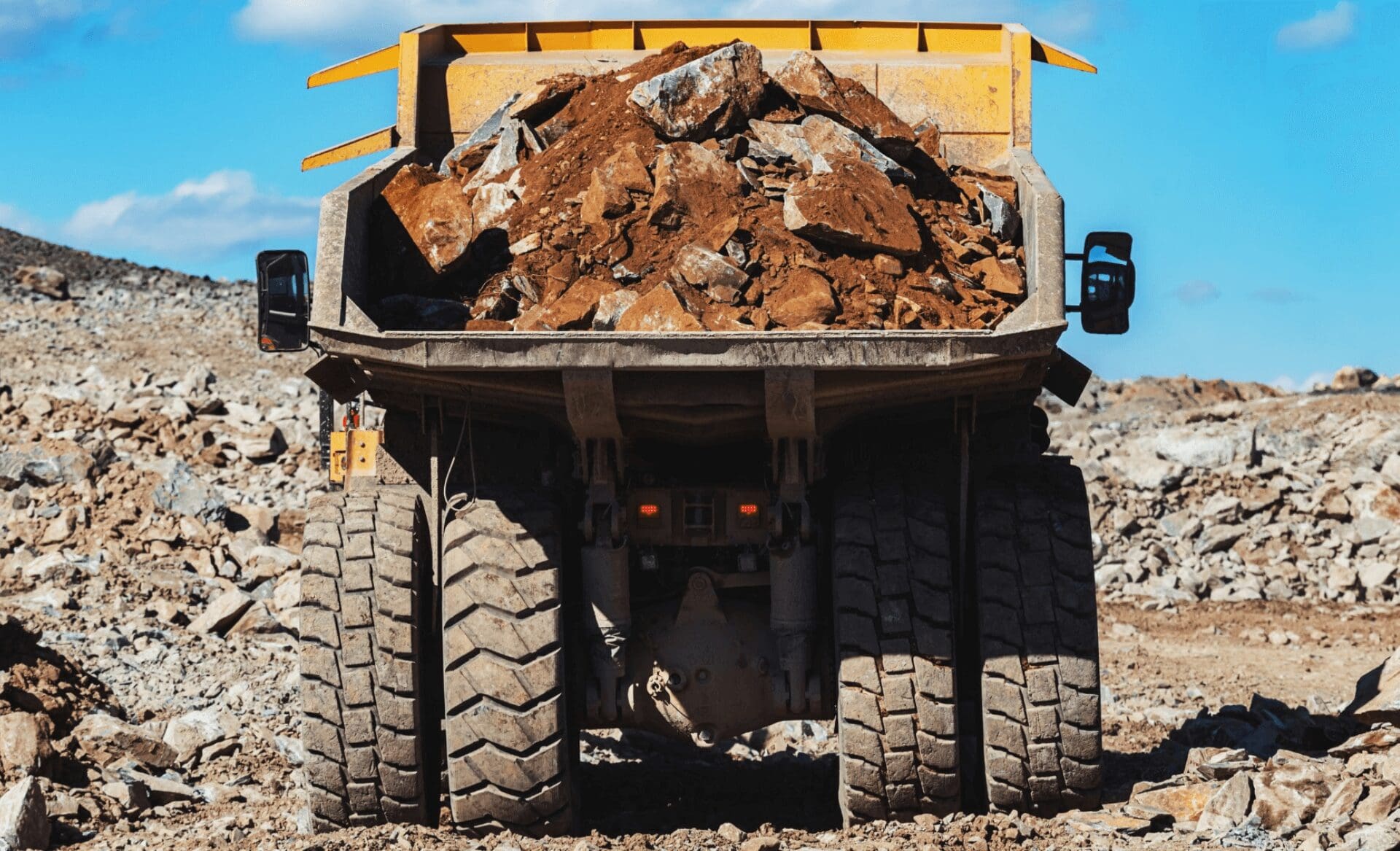 off highway equipment with material loaded in back