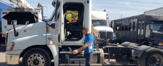 jaltest diagnostic technician performing scan on heavy duty truck