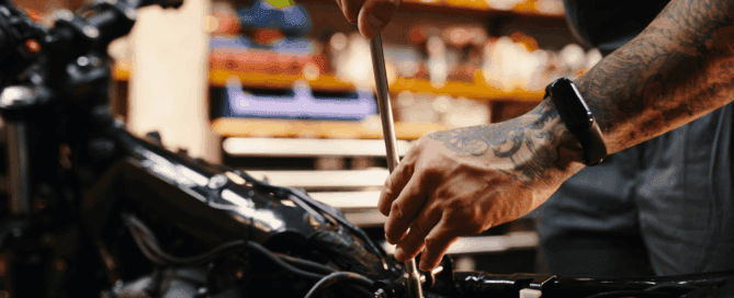 motorcycle diagnostic and repair in progress by mechanic